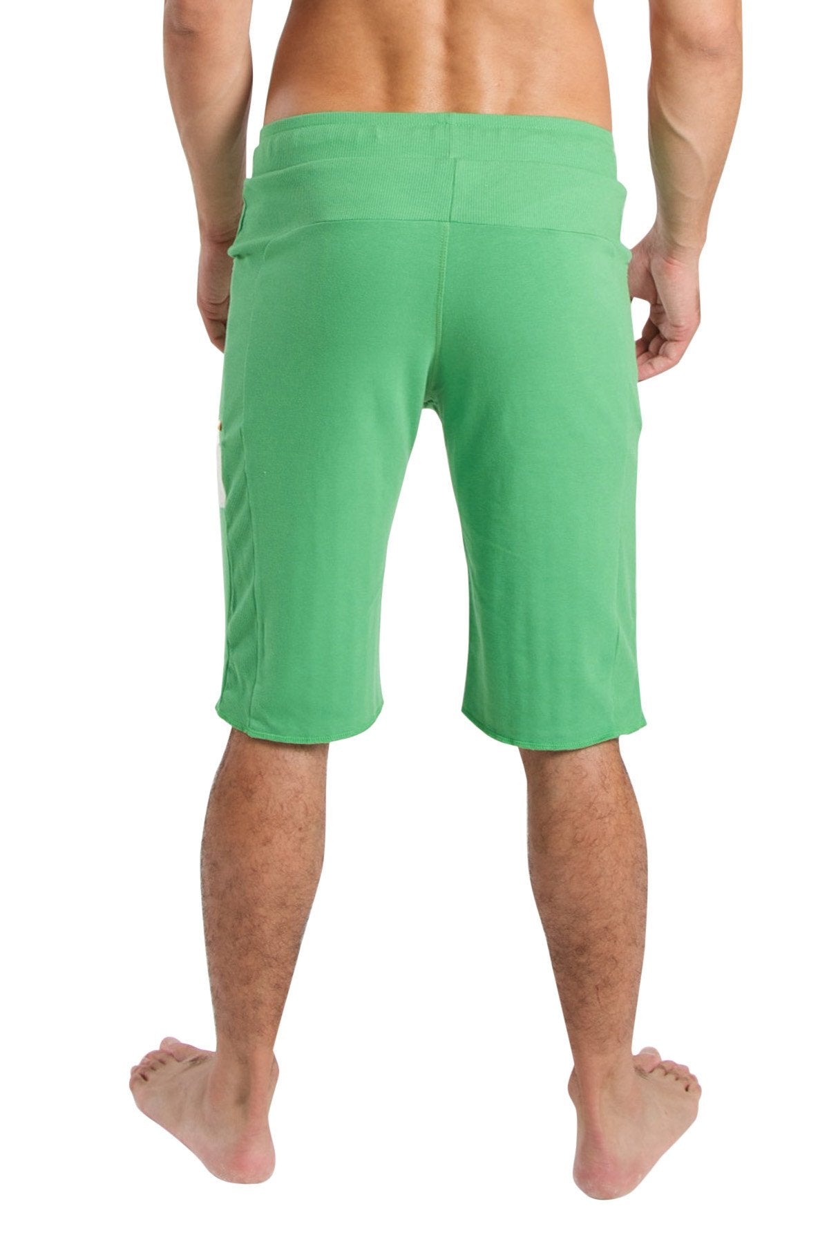 Edge eco-track short in bamboo green featuring relaxed fit green mid-thigh length shorts with side seam detailing