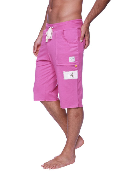 Pink cotton edge eco-track shorts in solid berry with white drawstring and patch pockets front view