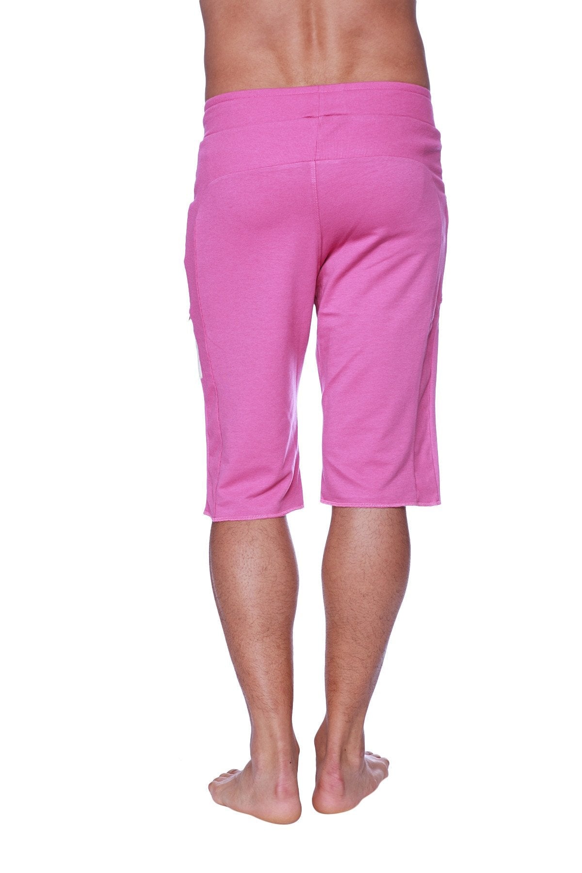 Pink edge eco-track shorts with elastic waistband and side pockets made from eco-friendly fabric for athletic use