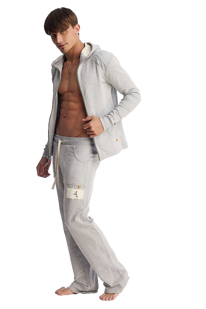 Light gray hooded sweatshirt with front zipper and subtle gold-tone branding paired with heather grey sweatpant