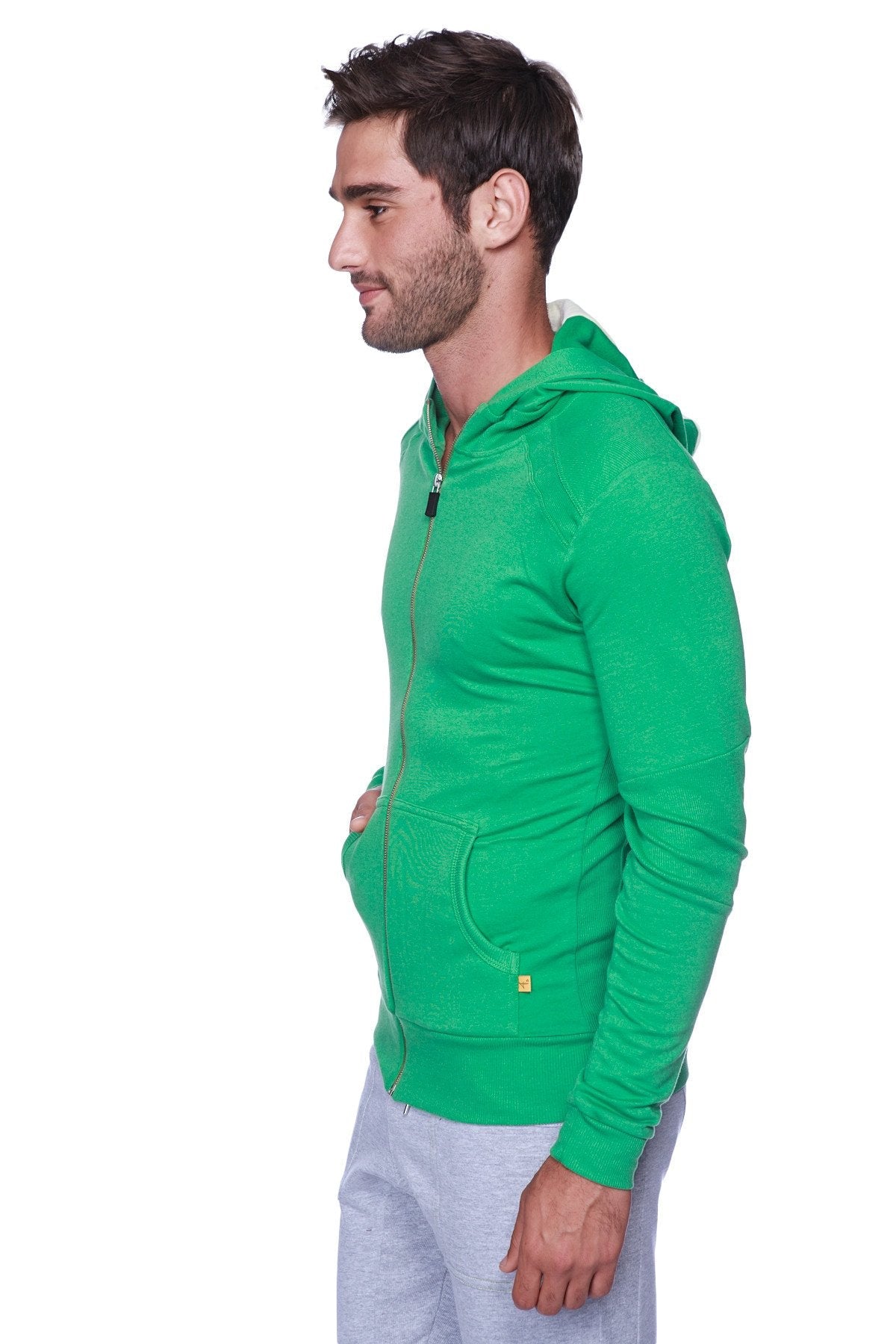 Edge form-fit crossover yoga track performance hoodie in bamboo green with soft textured fabric and subtle stitching details