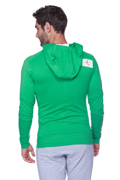 Back view of edge form-fit crossover yoga track performance hoodie in bamboo green with white patch on upper back