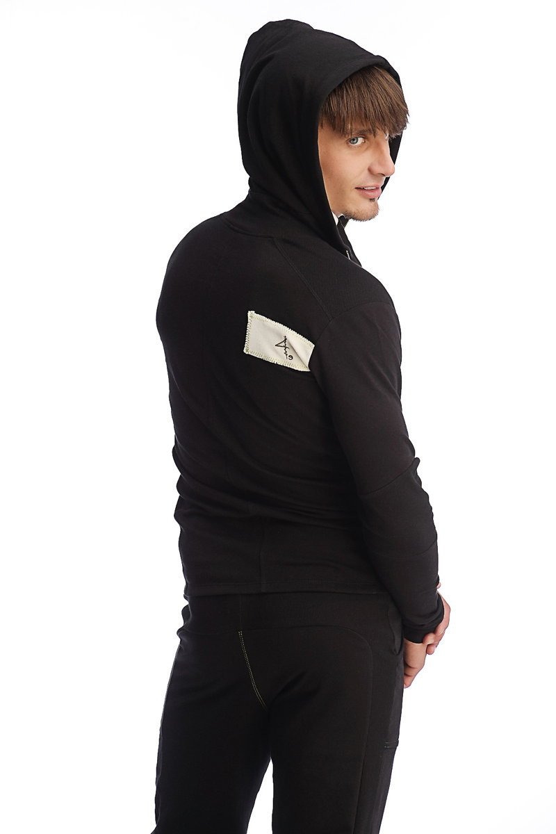 Black edge form-fit crossover yoga track performance hoodie with white logo patch on left sleeve in cotton blend material