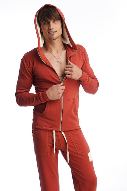 Edge form-fit crossover yoga track performance hoodie in cinnabar red with beige inner lining and zipper trim