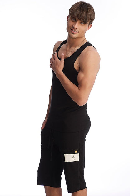 Black edge sustain tank top with fitted cut and subtle ribbed texture in sleeveless design