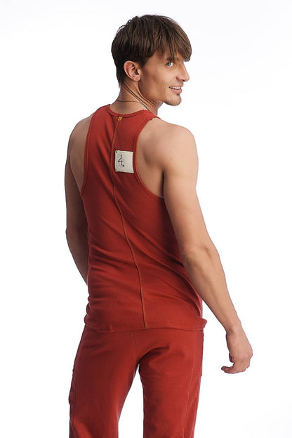 Back view of red cinnabar edge sustain tank top with a white label on the back made from sustainable material