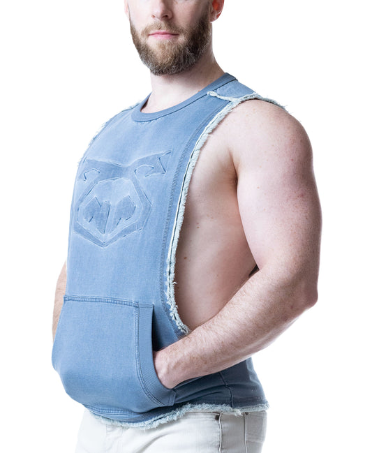 Mirage blue sleeveless shredded t-shirt with embossed pig logo and front pouch pocket.