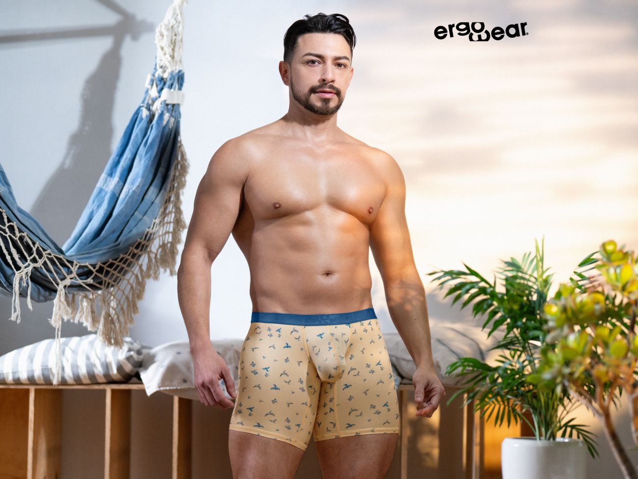 Beige ErgoWear EW1775 SLK SE boxer briefs with subtle blue and green pattern and solid navy waistband in peach birds color