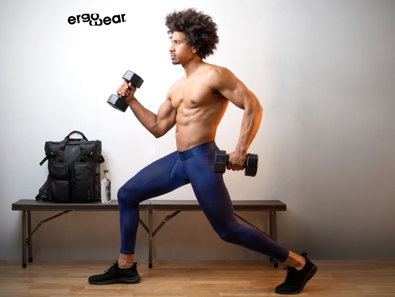 ErgoWear ew1782 max bold dark blue athletic pants shown with black ergonomic dumbbells with matte finish and textured grip