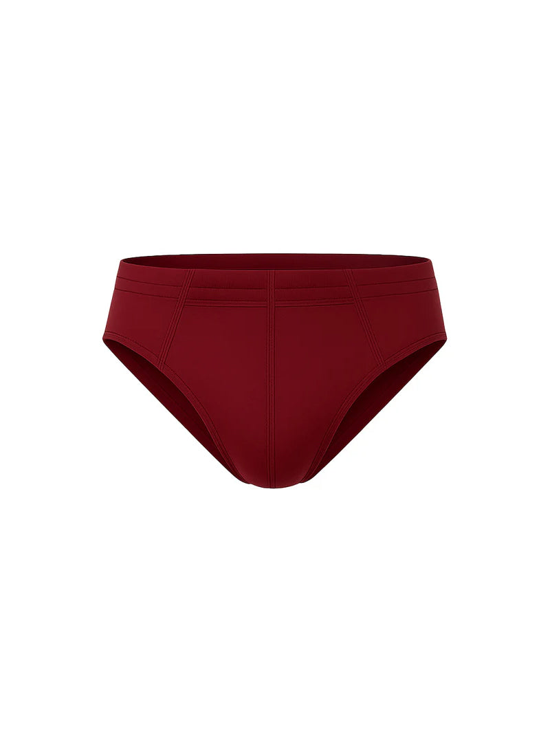 A sleek solid burgundy essential cotton brief with smooth fabric finish and subtle seam detailing