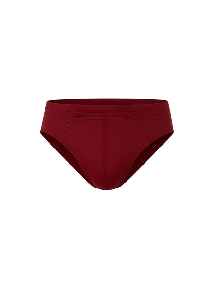 A sleek solid burgundy essential cotton brief with smooth fabric finish and subtle seam detailing
