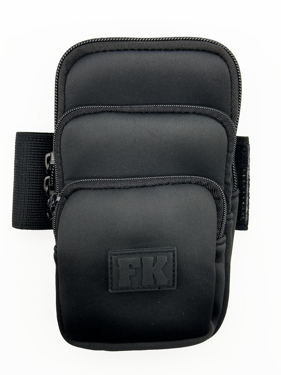 Black fk sport neoprene arm band with three zippered pockets and textured fabric finish for secure storage