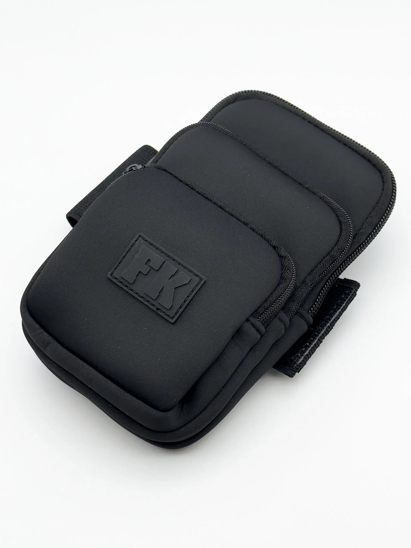 Black fk sport 3 pocket neoprene pouch wristlet with multiple zippered compartments and sleek minimalist design