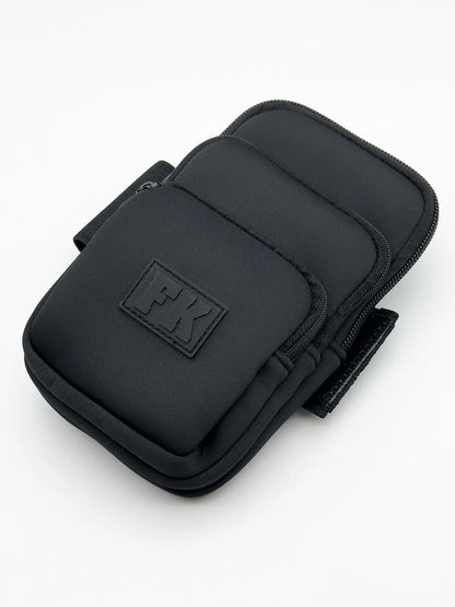 Black fk sport 3 pocket neoprene pouch wristlet with multiple zippered compartments and sleek minimalist design