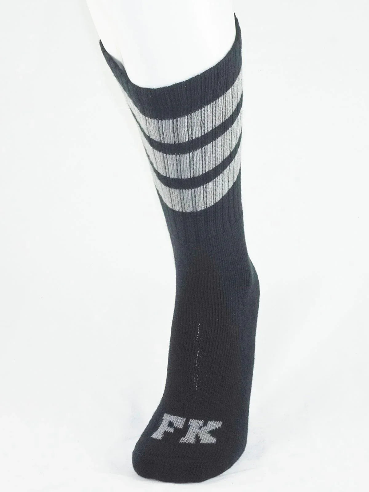 Fk sport black tube sock with three gray stripes and silver fk logo embroidered on the toe for athletic use