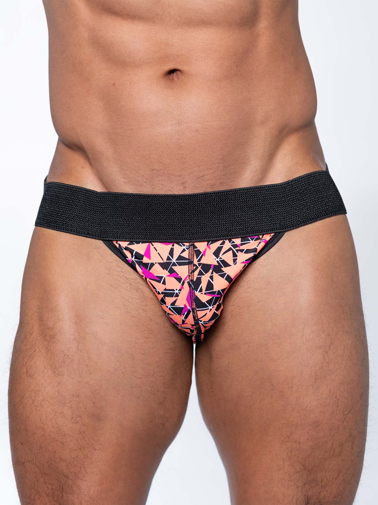 A vibrant geometric-patterned fk sport radical jock brief with a black elastic waistband