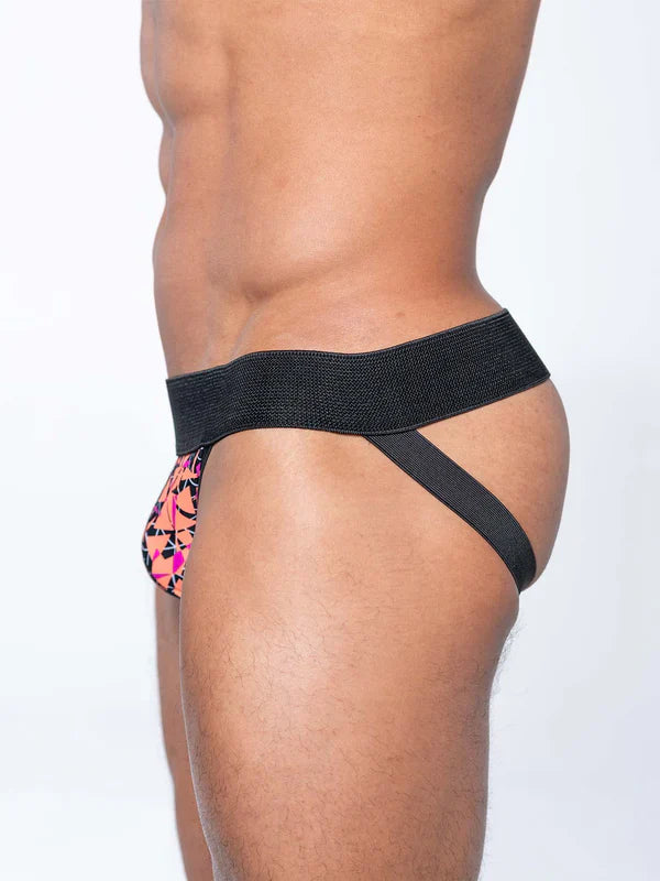 Fk sport radical jock with black elastic waistband and leg straps and vibrant pink orange black geometric pouch