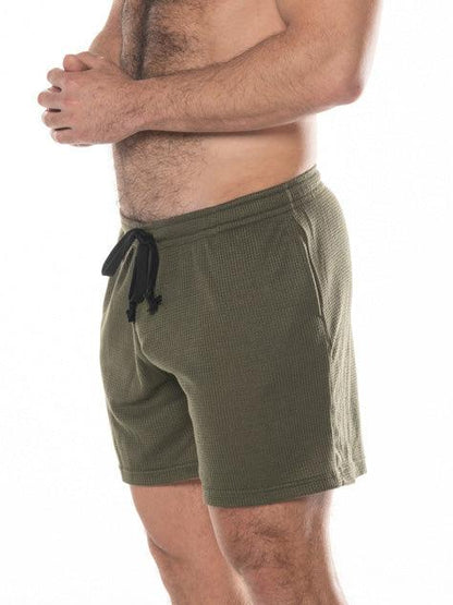 Olive green waffle knit shorts with black drawstring from fk sport swinger short collection for active wear