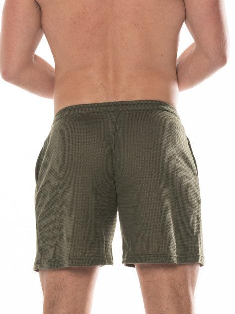 Olive green waffle-knit fk sport swinger shorts showcasing textured fabric and comfortable fit for active wear
