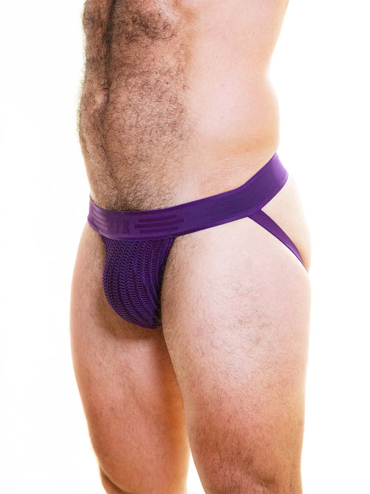 Side view of a person wearing a purple jockstrap with a thick, textured mesh pouch and matching waistband.
