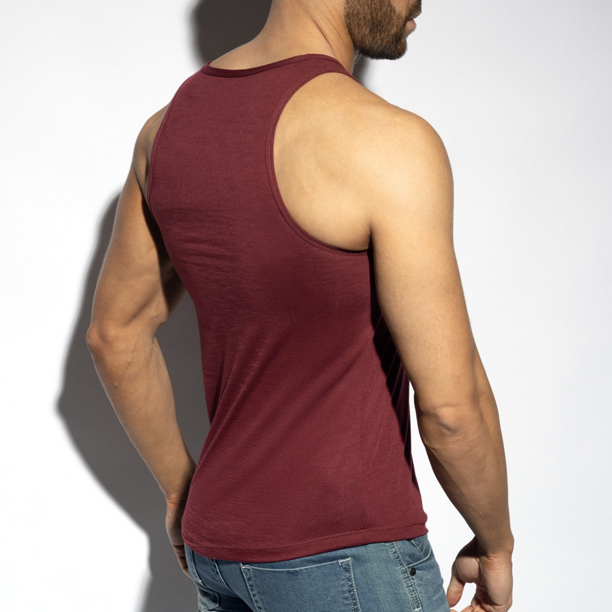 A maroon flame tank top sleeveless with a simple round neckline and ribbed hem for casual wear