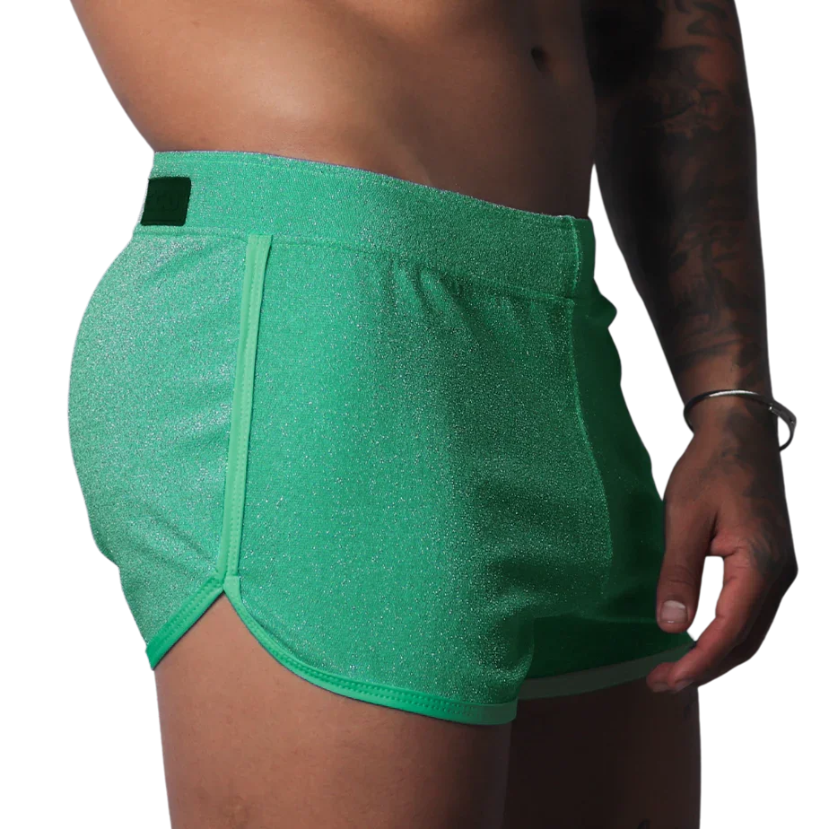 Gigo Flash green short with a shimmery fabric finish, side piping, and a branded waist tab.