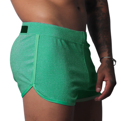 Gigo Flash green short with a shimmery fabric finish, side piping, and a branded waist tab.