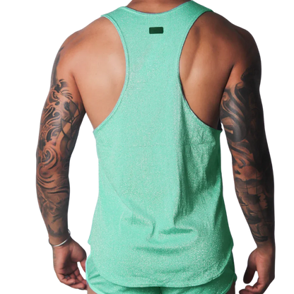 Shimmering mint green racerback tank top with a small rectangular logo patch on the upper back.