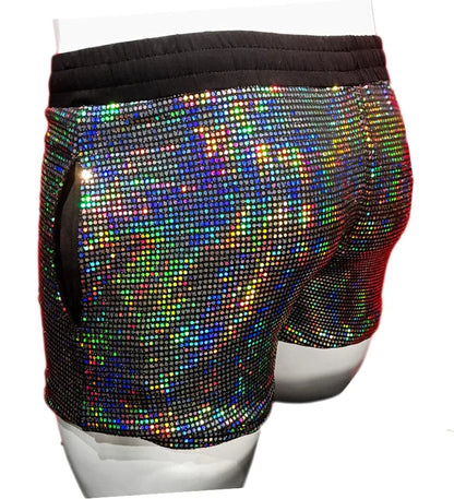 Shiny rainbow-hued flat sequin shorts with black elastic waistband made of sequined fabric for vibrant style
