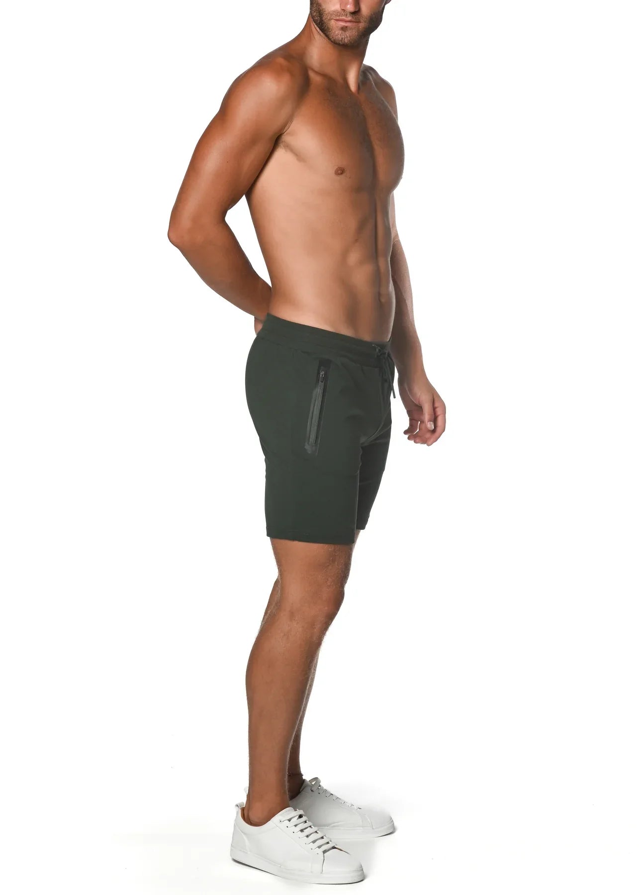 Dark green fleece flex-cotton stretch shorts with sleek modern design and zippered side pocket for athletic use