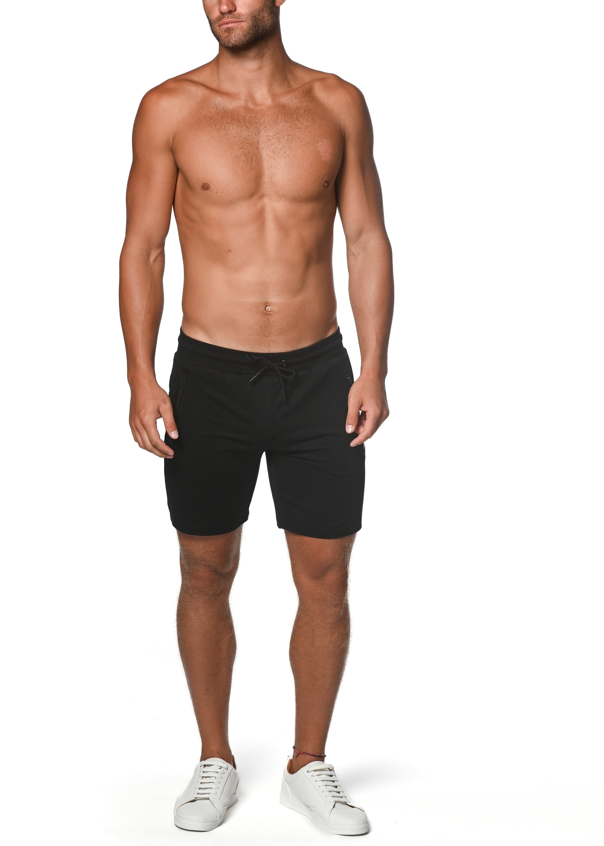 Black fleece flex-cotton stretch shorts with drawstring waistband designed for comfort and flexibility