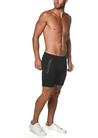 Black fleece flex-cotton stretch shorts with a sleek modern design and subtle vertical side zipper detail