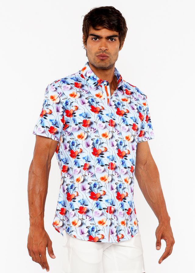 A vibrant floral 3d print stretch knit short-sleeved shirt in reds blues and purples on a white background