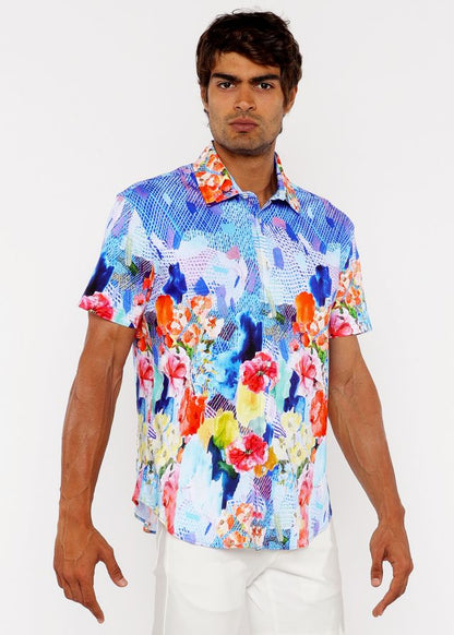 Vibrant floral abstract short-sleeved woven modal border shirt in blue pink orange and yellow on a light background