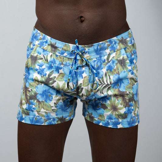 Blue and green floral print linen texture swim shorts with a drawstring waistband for casual beachwear