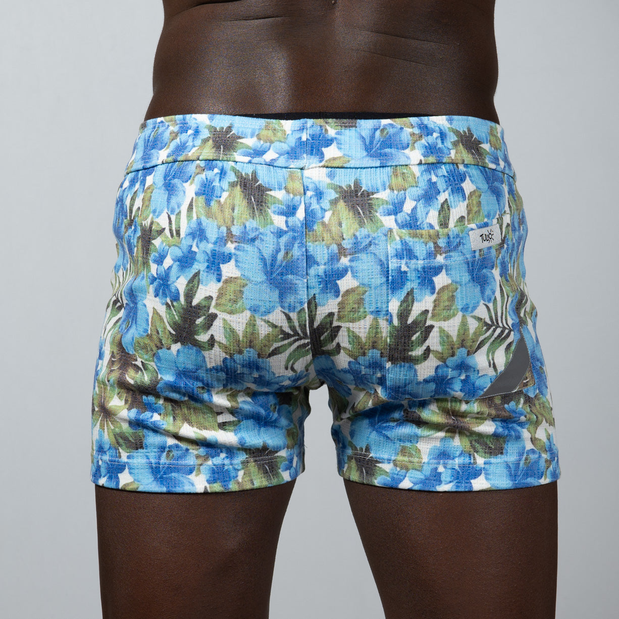 Blue and green floral print linen texture shorts with a textured fabric perfect for casual summer wear