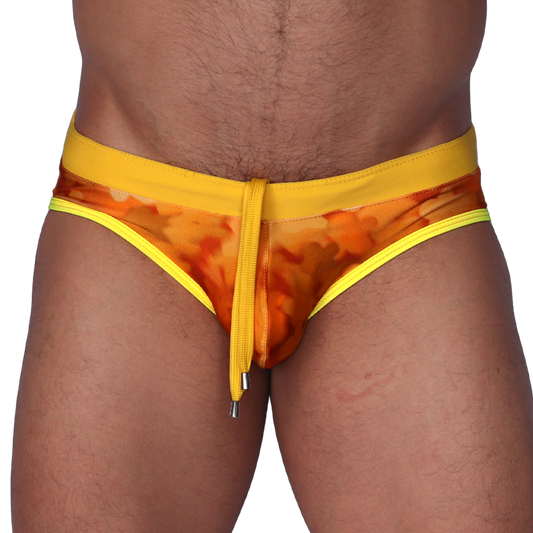 Front view of Gigo floral yellow swim brief with solid waistband, drawstring, and metallic tips.