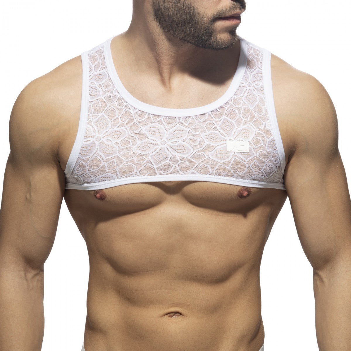 White lace tank top with floral pattern and solid white trim from the flowery lace harness collection