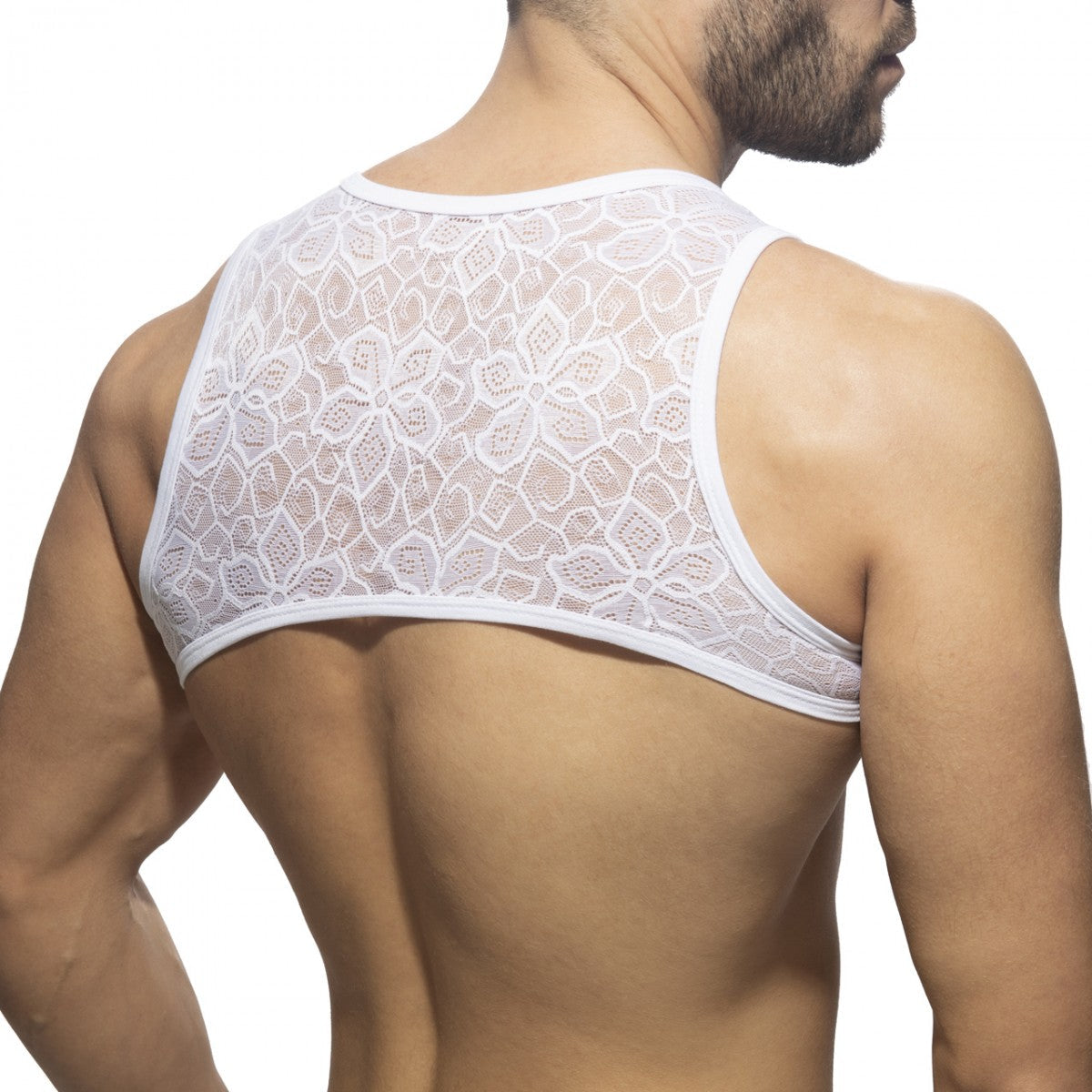 White floral lace harness tank top featuring delicate lace material and floral design for stylish layering