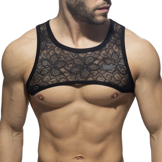 Black lace tank top with floral pattern and solid black trim in flowery lace harness design