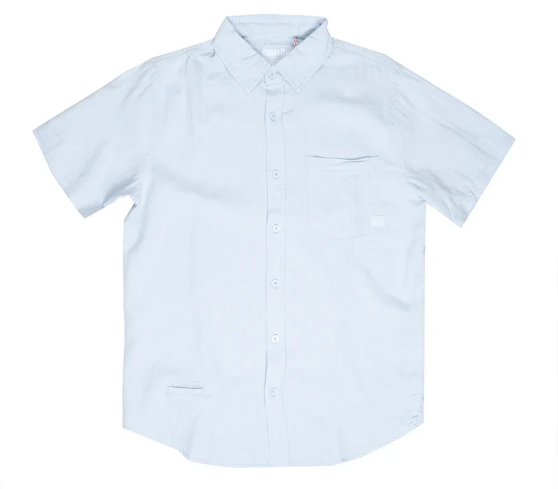 A crisp white fly linen shirt with short sleeves, classic collar, button-up front, and chest pocket
