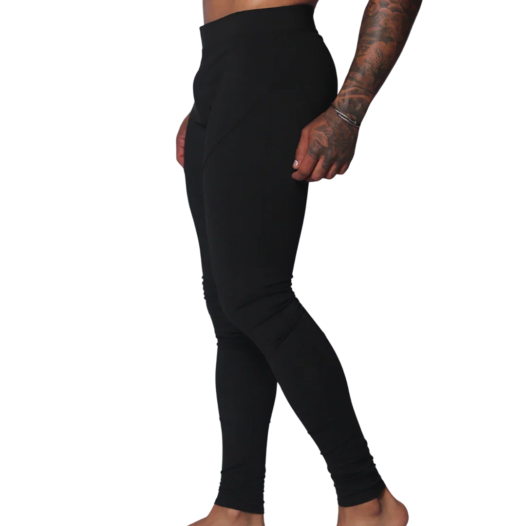 Form-fitting black Lycra leggings featuring a high-rise waistband and minimalist athletic design.
