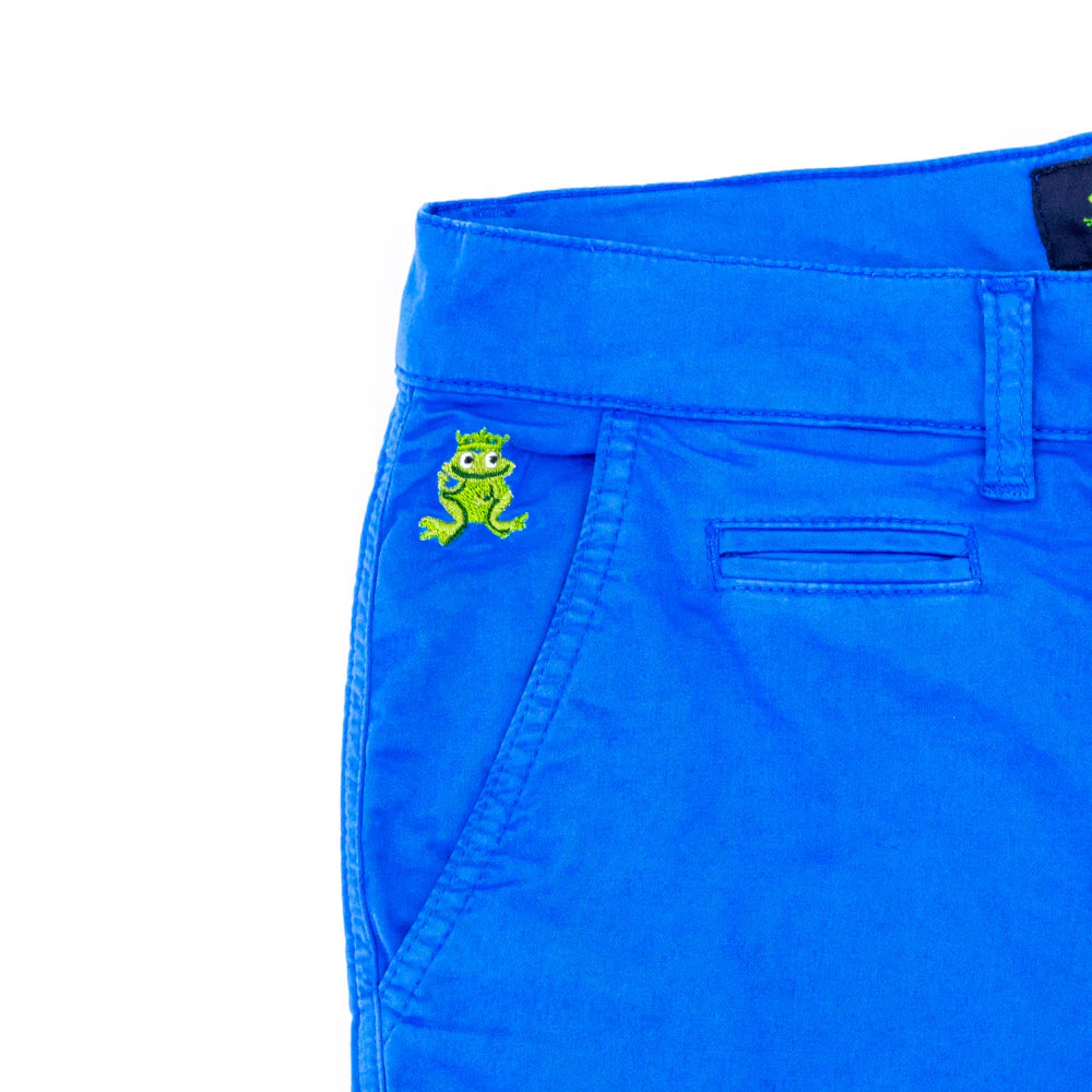 Bright blue chino short pants with a small green embroidered frog logo on the front pocket