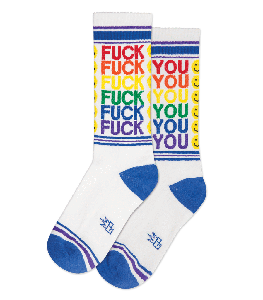 White crew socks with rainbow colored fuck you text and smiley faces blue toe caps and striped cuffs fu smiley face crew socks