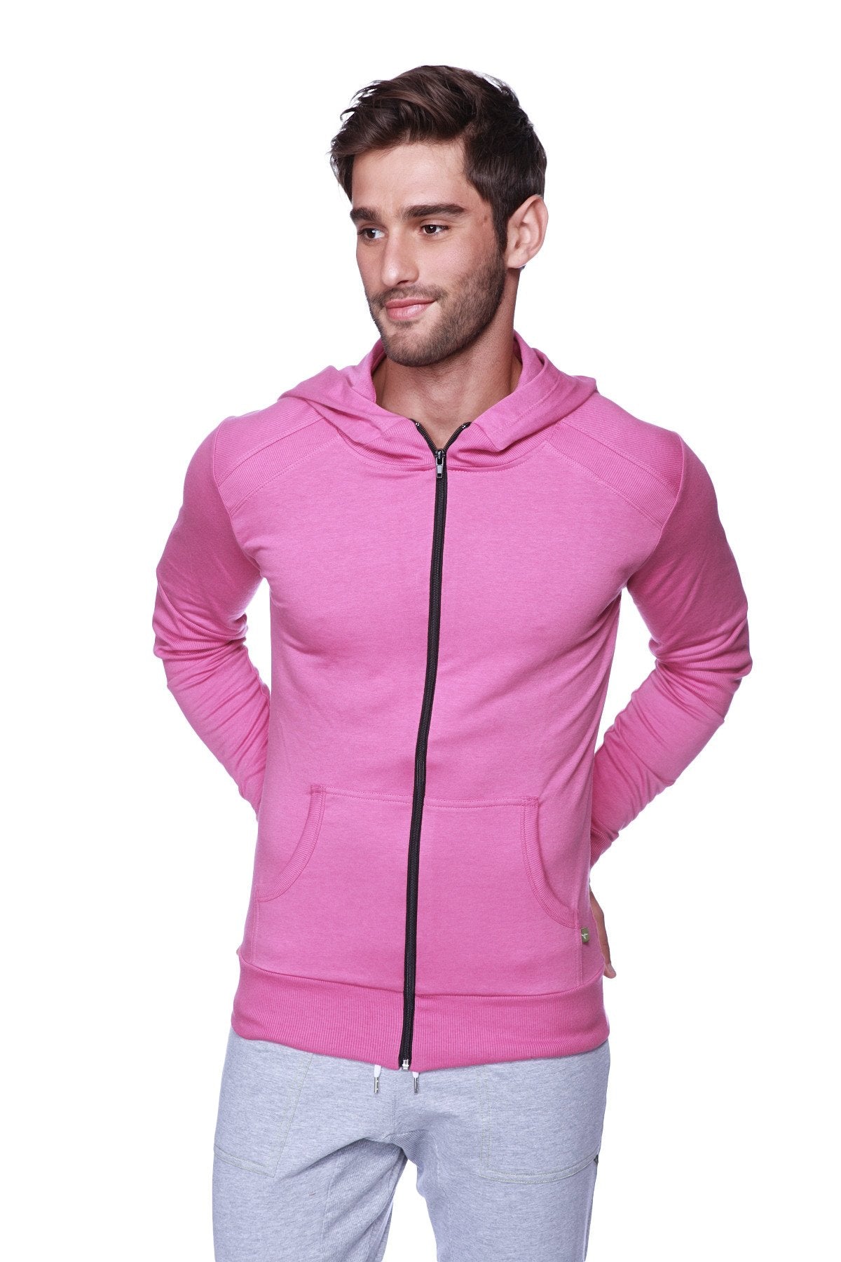 Form-fit crossover yoga track performance hoodie in vibrant pink with black zipper and front pockets for active wear