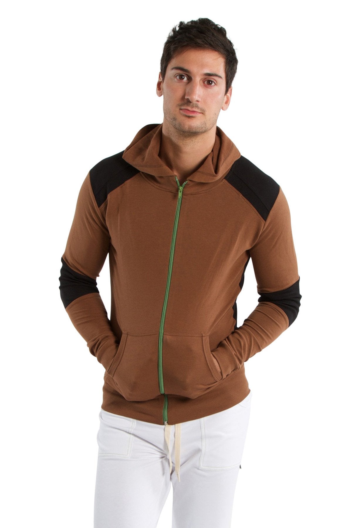 Form-fit crossover yoga track performance hoodie in chocolate and black with green zipper pull and zip-up front