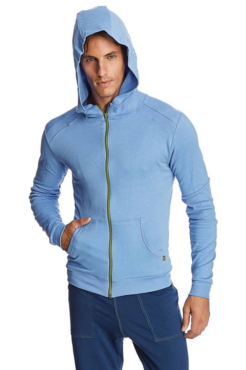 Form-fit crossover yoga track performance hoodie in light blue with green zipper and subtle seam detailing