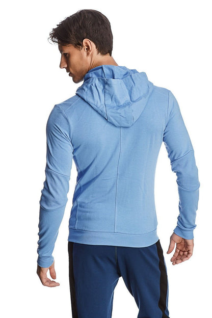 Ice blue long-sleeved hooded zip-up jacket with a sleek athletic cut for yoga and track performance