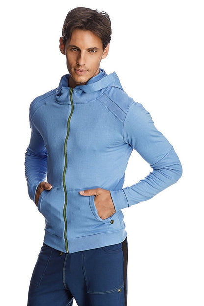 Form-fit crossover yoga track performance hoodie in ice blue with green zipper and textured shoulder panels