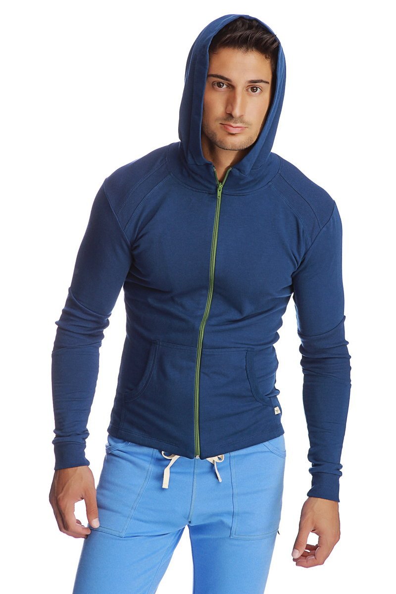 Form-fit crossover yoga track performance hoodie in navy blue with lime green zipper and white drawstrings for athletes